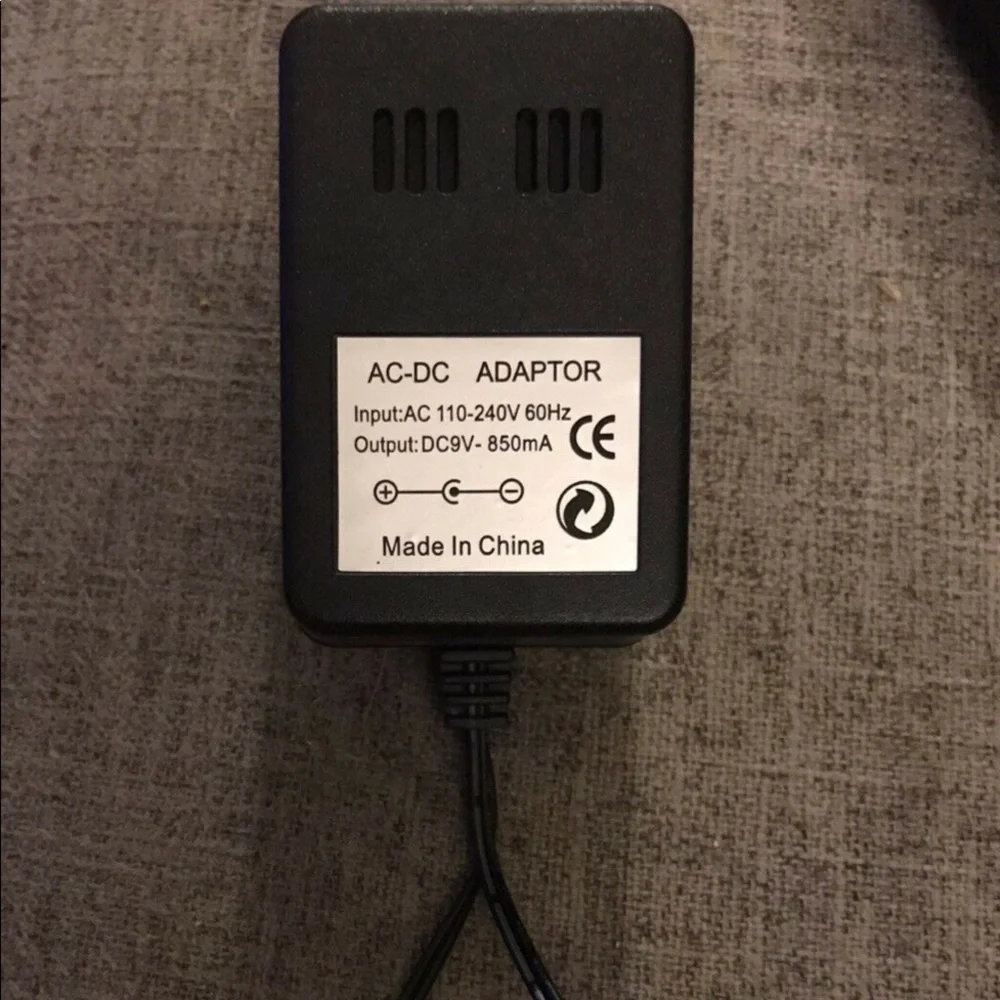 AC-DC Adaptor Input AC 110-240V 60Hz Output DC 9V - 850 mA Replacement Part Cord